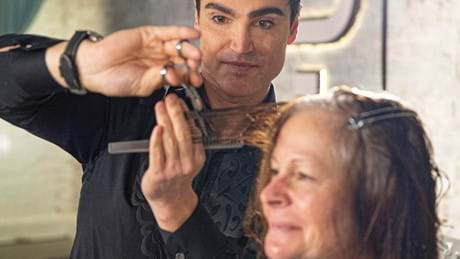 Glam Guru Cuts Hair